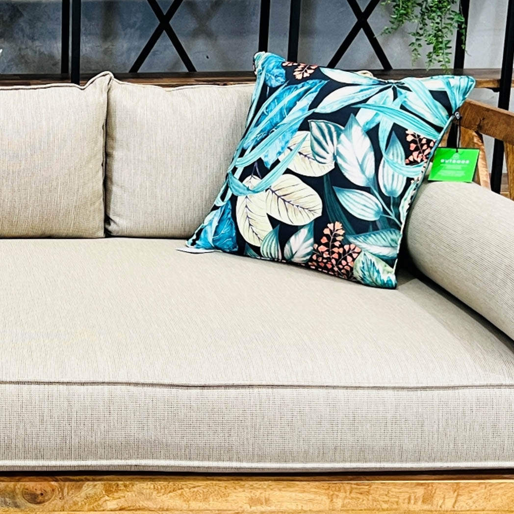 Bold colour cushions paired with neutral lounge.
